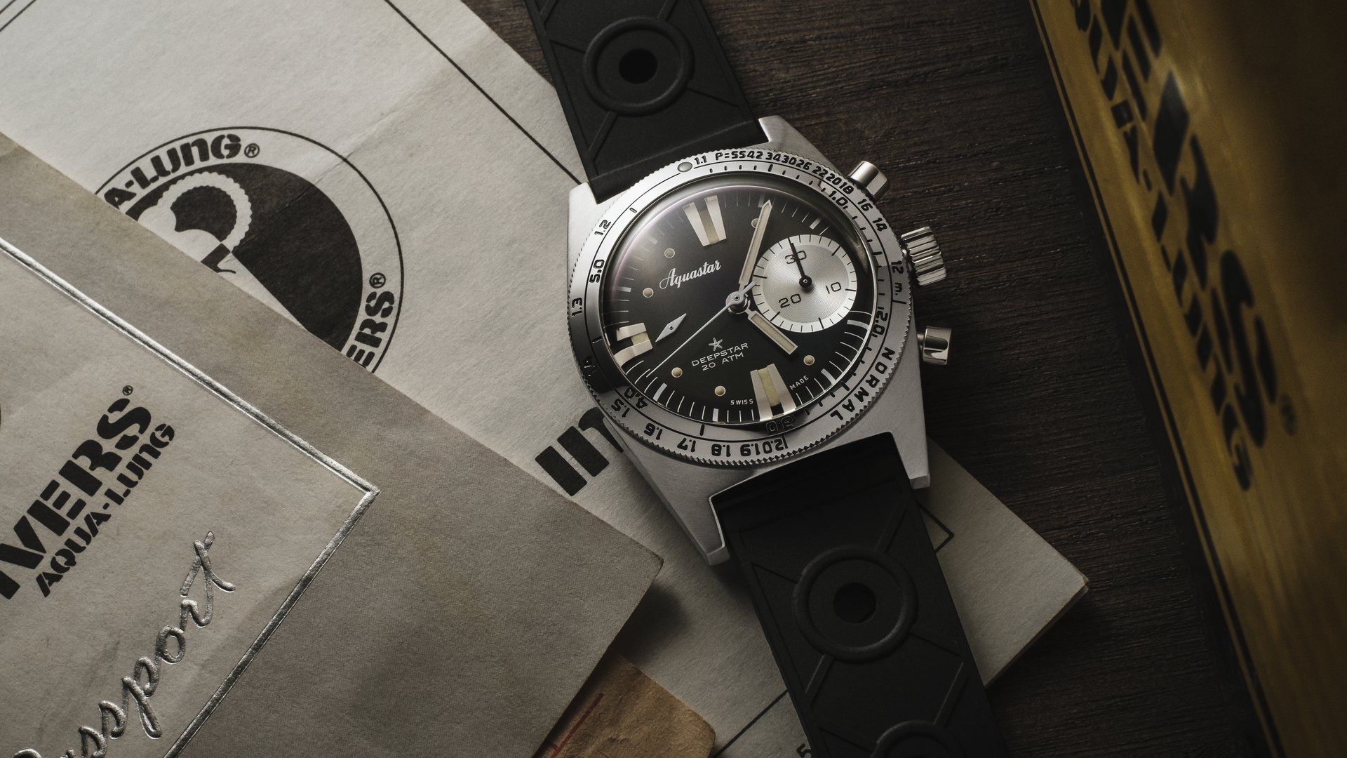 Aquastar Deepstar Chronograph on Tropic rubber strap with vintage US Divers Aqua-Lung manuals